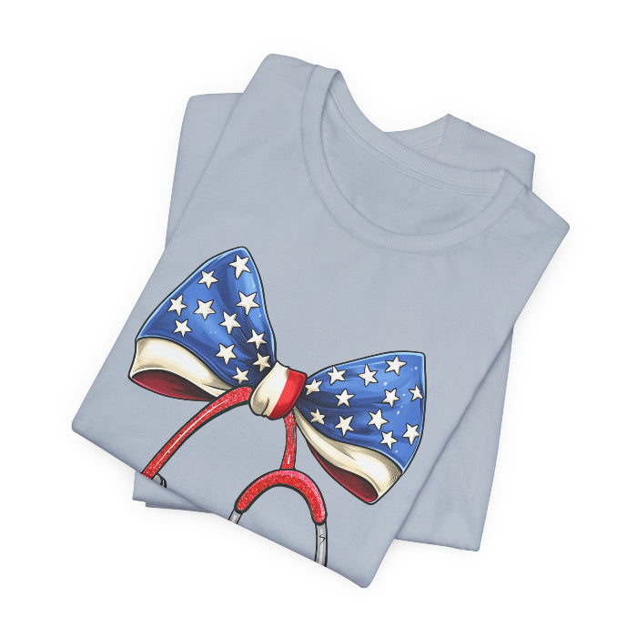 Folded_5_d0fb56fb-ae50-4541-8d8d-df546f6cc9f5 July 4th Stethoscope Bow T-Shirt - Image 6