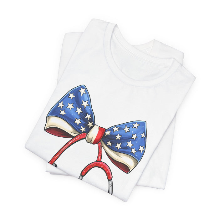 Folded_c123d5bf-fa02-430b-96ae-721f155ccaf0 July 4th Stethoscope Bow T-Shirt - Image 9